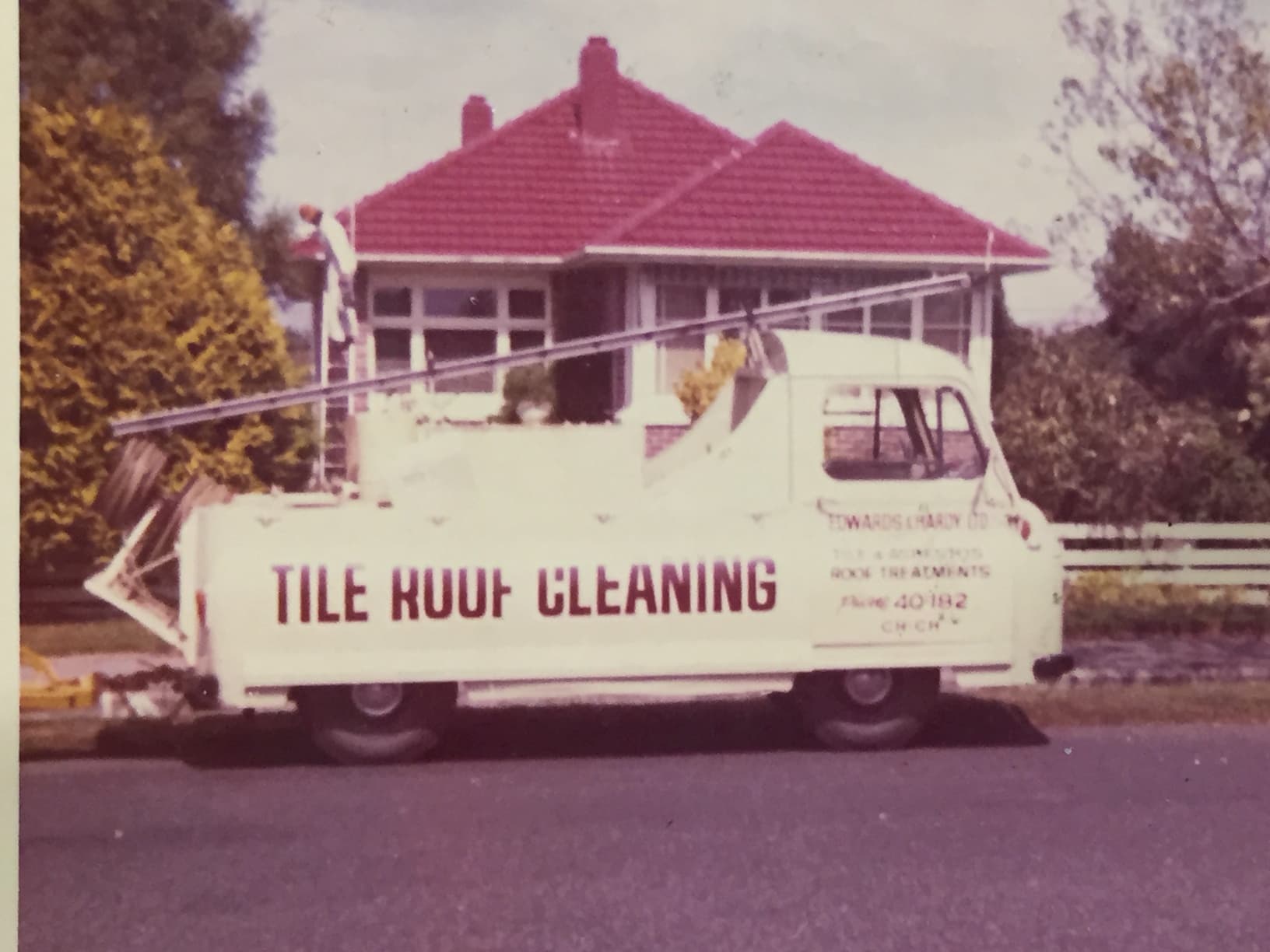 An early Edwards & Hardy truck with Tile Roof Cleaning painted on its side