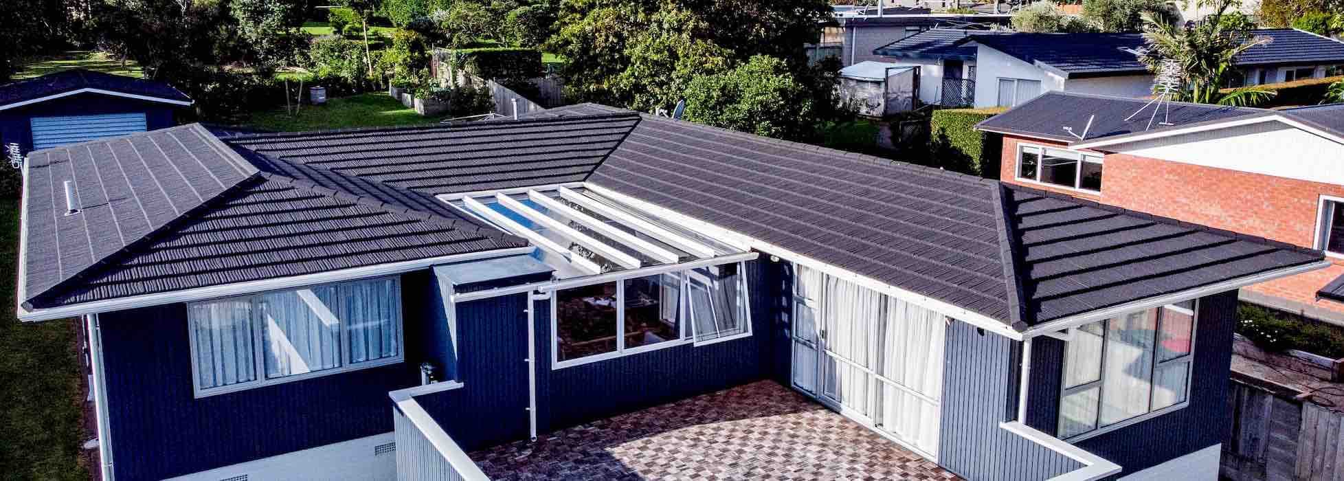 Side view of a residential roof showing roof pitch angle on a New Zealand home