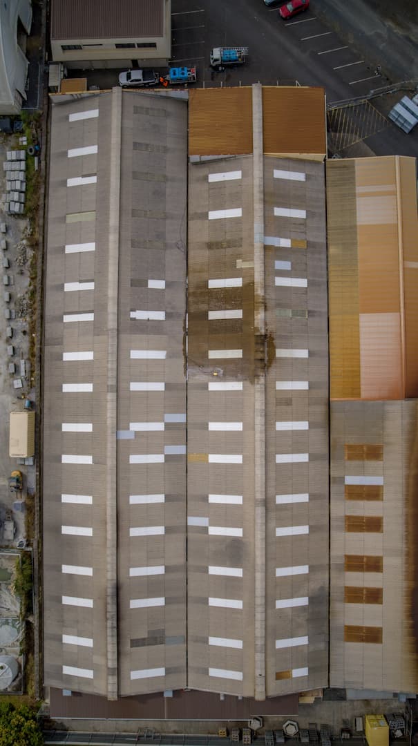 Drone performing roof inspection