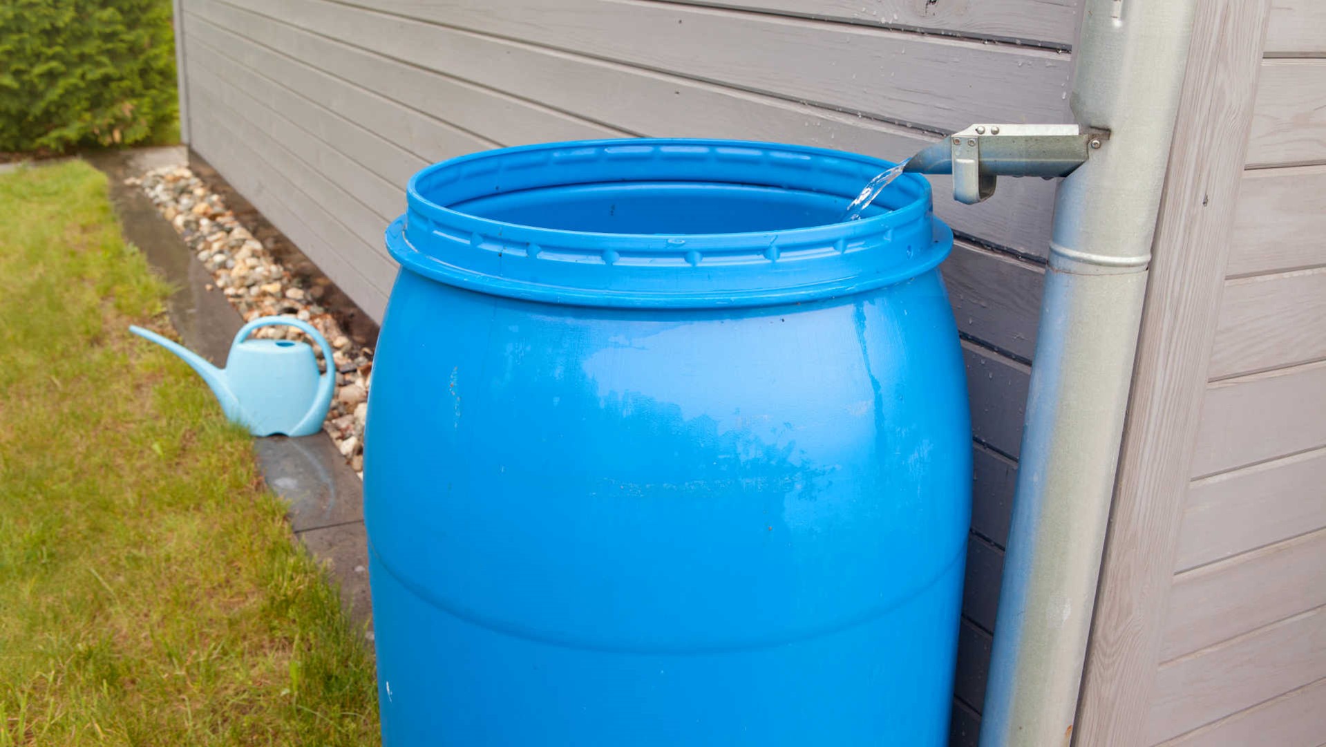 Rainwater collection gutters - barrel set up for rainwater harvesting