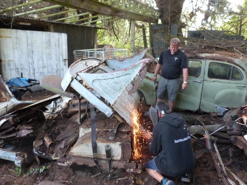 hree Morris/Austin pickups lying in a broken down barn in Ferrymead, Christchurch