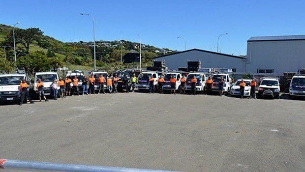 Edwards & Hardy Wellington branch team with service vehicles in front of office location in Plimmerton