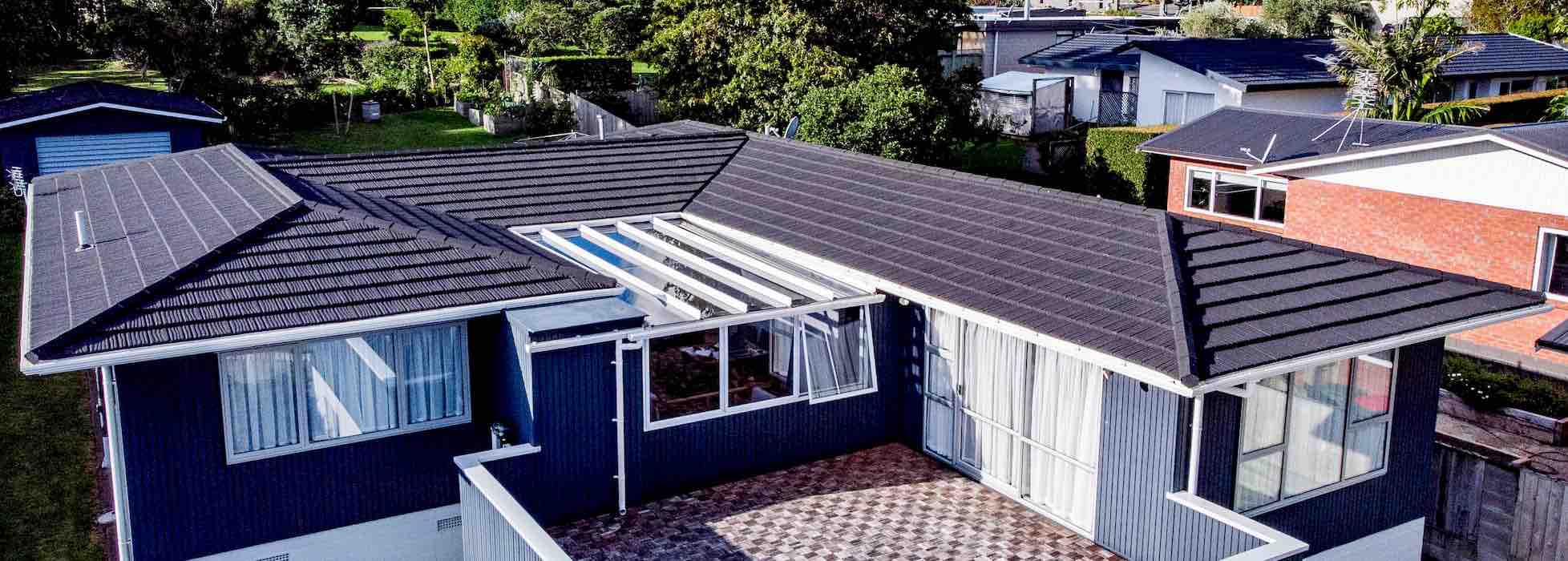 Side view of a residential roof showing roof pitch angle on a New Zealand home