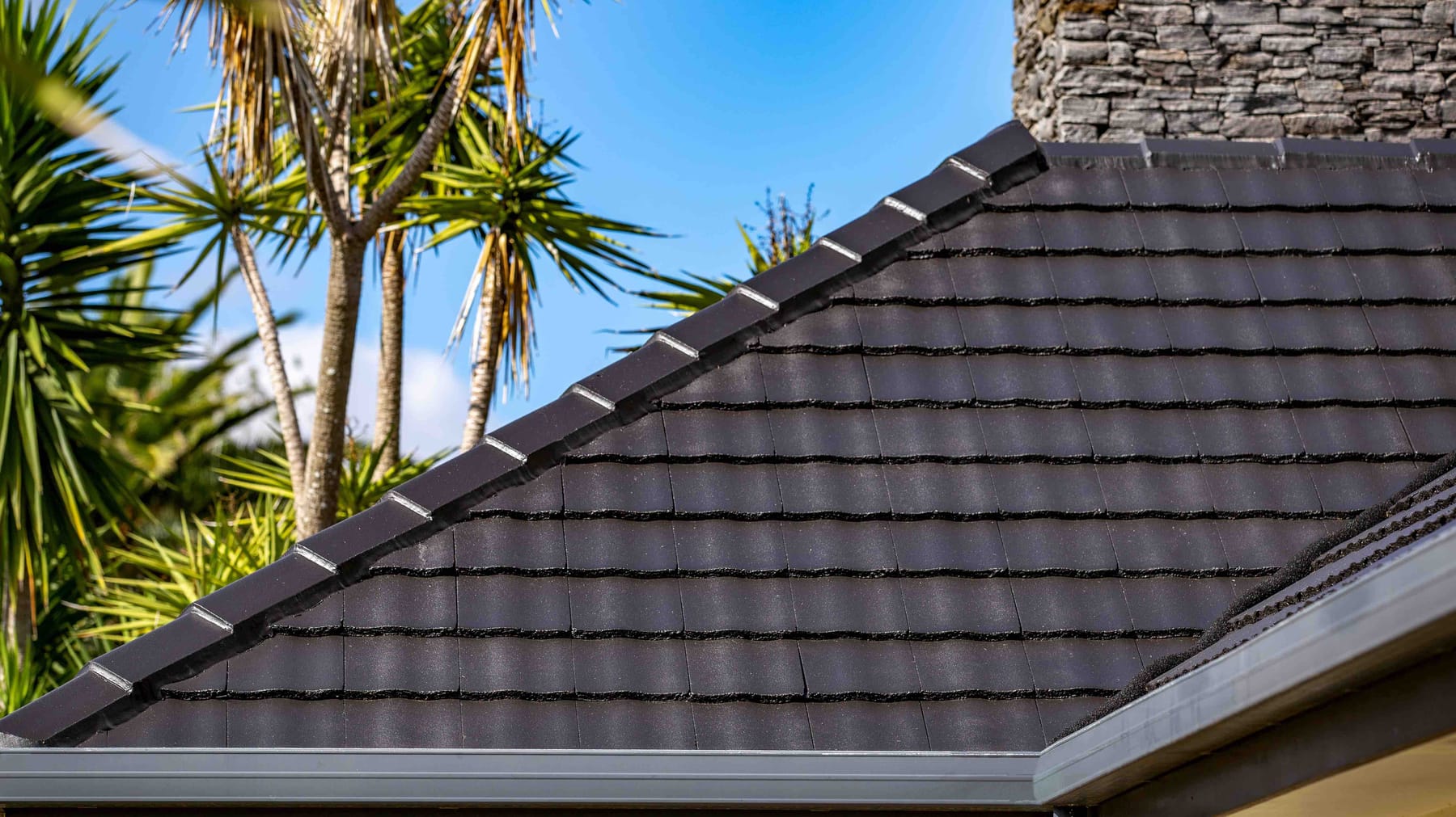 Coated roof tile detail on a completed project